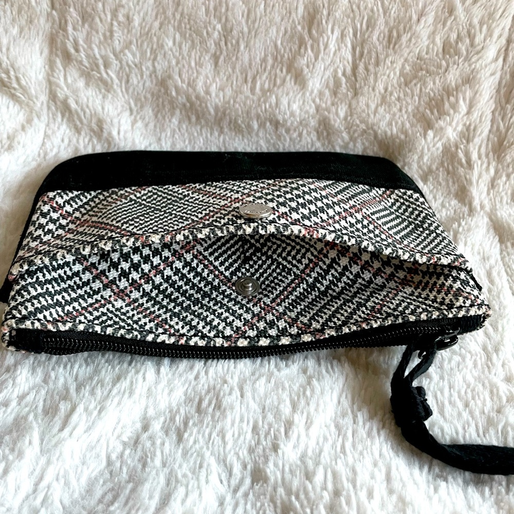 Black/white with red accent stripe wristlet. Outside button close slip pocket. - Picture 3 of 4